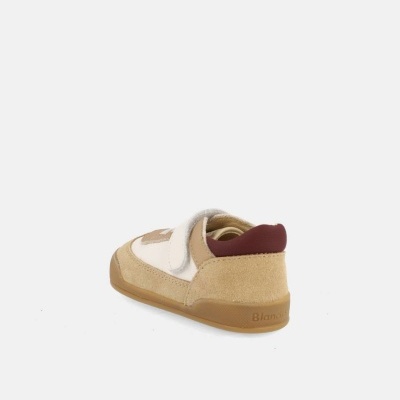 Ténis de criança bege e branco com fecho de velcro e sola castanha