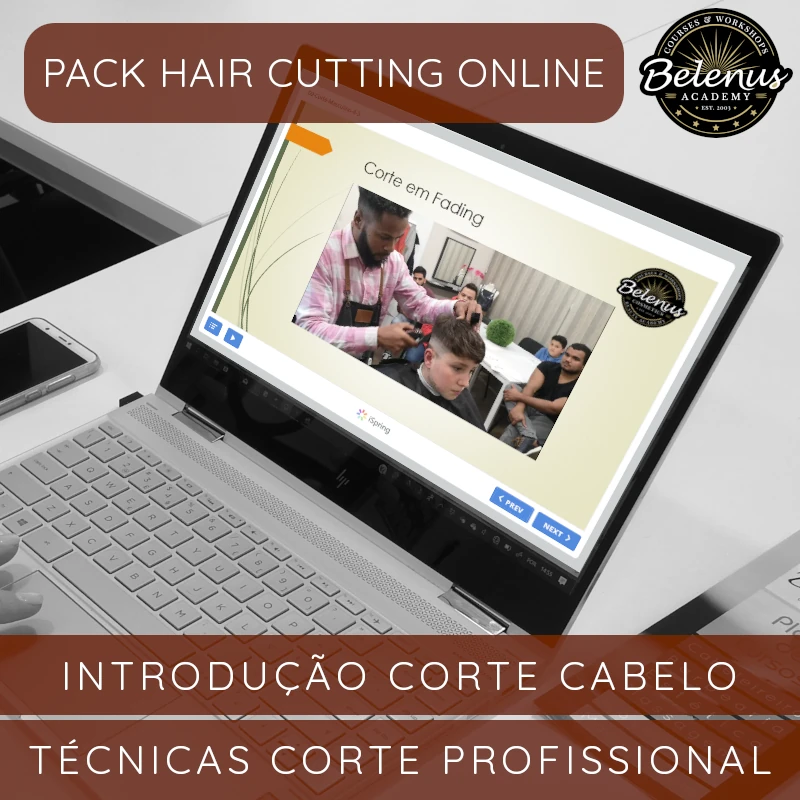 Pack Starter Duo: Cortes Cabelo em Barbearia & Cabeleireiro Computador portátil aberto com apresentação online sobre corte de cabelo em fading.