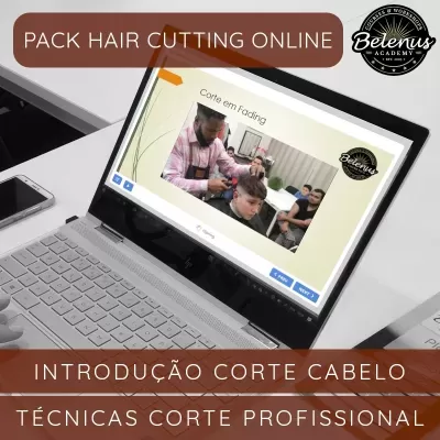 Computador portátil aberto com apresentação online sobre corte de cabelo em fading.