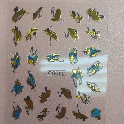 Adesivos para unhas dourados e azuis com padrões de folhas e flores e código C6602