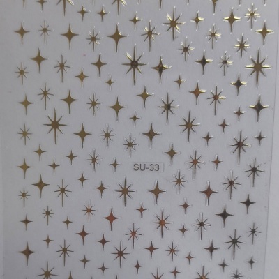 Folha branca com desenhos dourados de estrelas e código SU-33