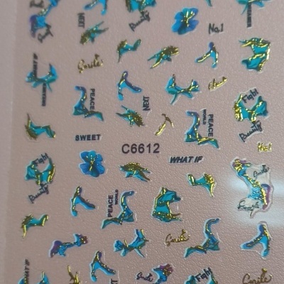 Autocolantes para unhas com desenhos coloridos e palavras em inglês.