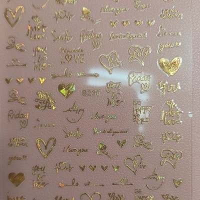 Folha de adesivos dourados com frases e desenhos em fundo rosa claro