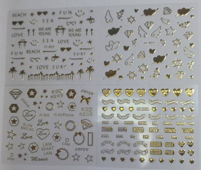 Folhas de autocolantes com desenhos dourados e pretos variados