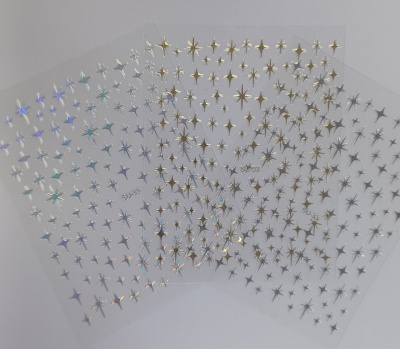 Folhas de autocolantes em forma de estrelas, em prateado, dourado e iridescente