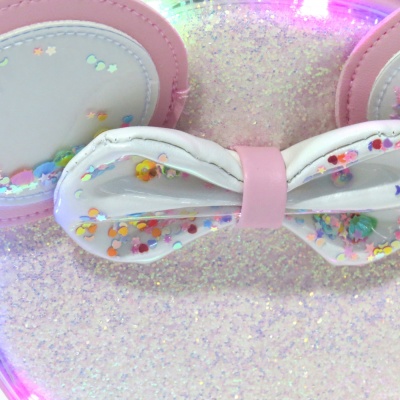 Tiara infantil rosa e branca com laço e glitter colorido