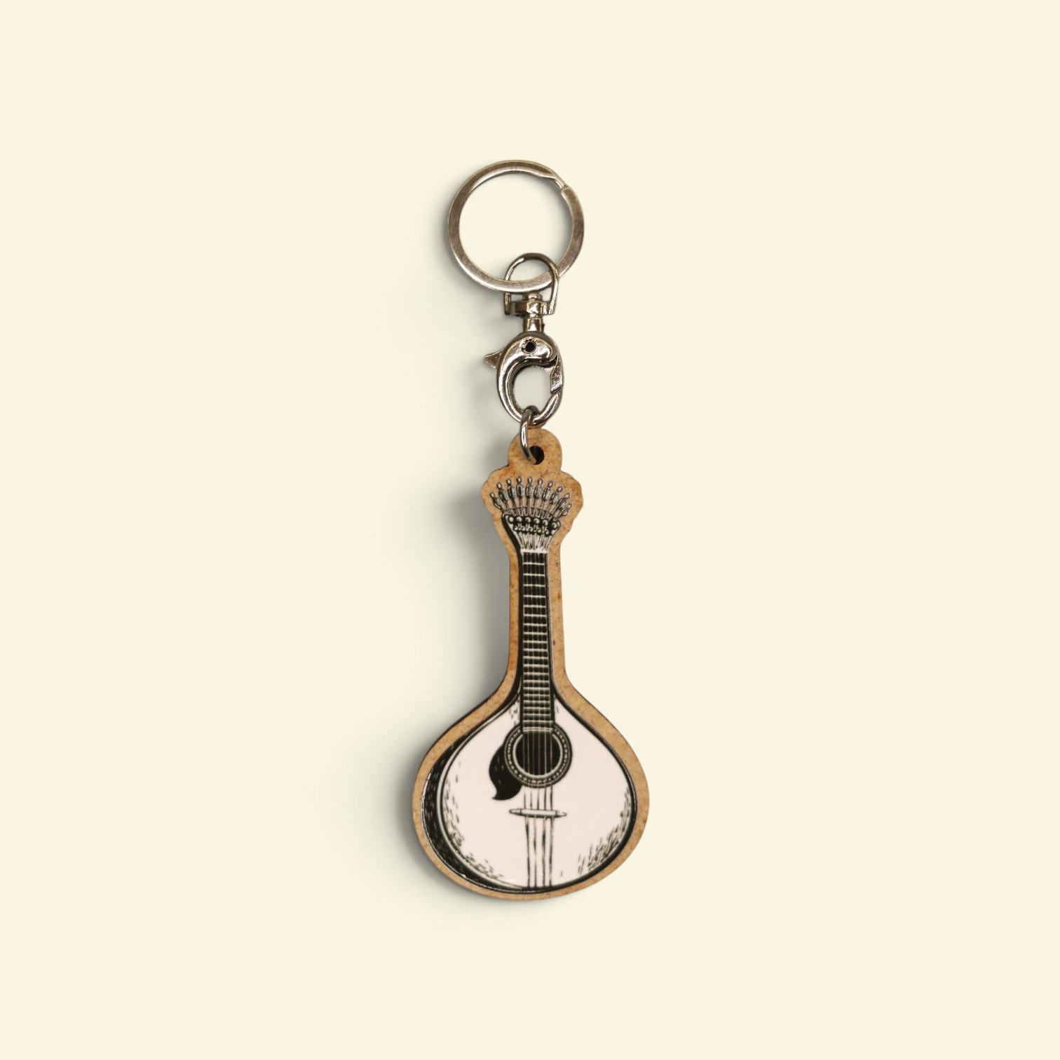 Porta-chaves Guitarra Portuguesa Chaveiro com pendente em forma de guitarra portuguesa em madeira clara