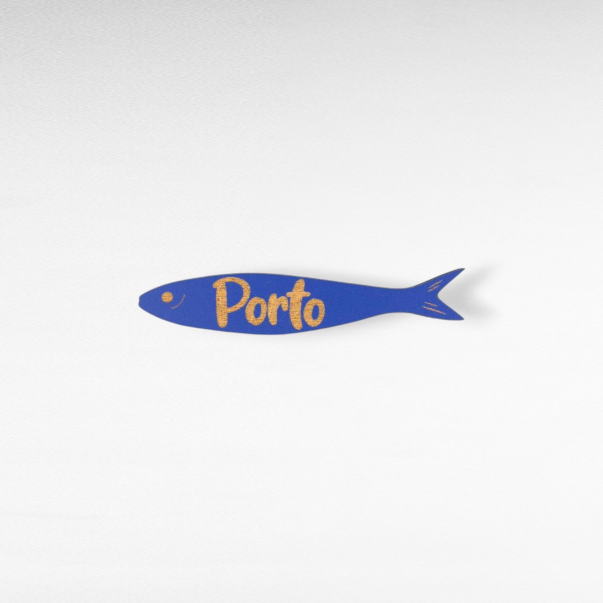 Magnético Sardinha 'PORTO' Figura em forma de sardinha azul com a palavra Porto em dourado