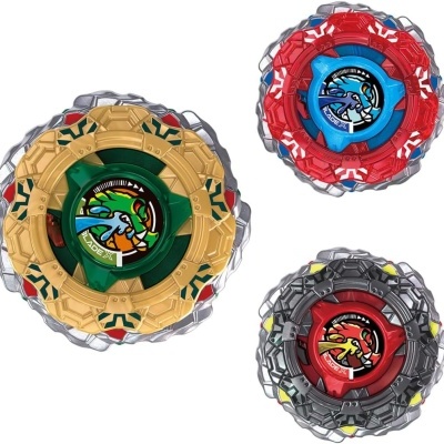 Three colorful spinning top toys with central stickers labeled BLADE X on white background