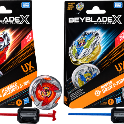 Two Beyblade X spinner toy packages with red-silver and blue-green-silver tops and launchers