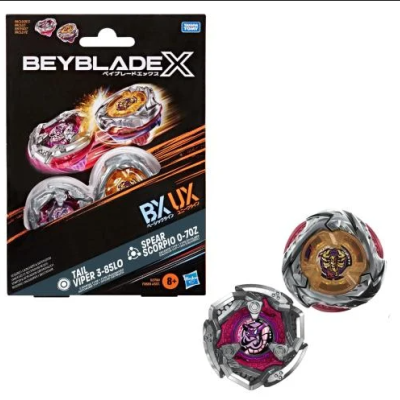 Beyblade X spinning tops set in black packaging with two tops outside the box