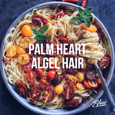 Prato de esparguete com tomates cherry e folhas verdes, texto PALM HEART ALGEL HAIR
