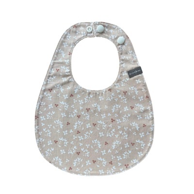Babete bege com padrão floral e fecho de pressão