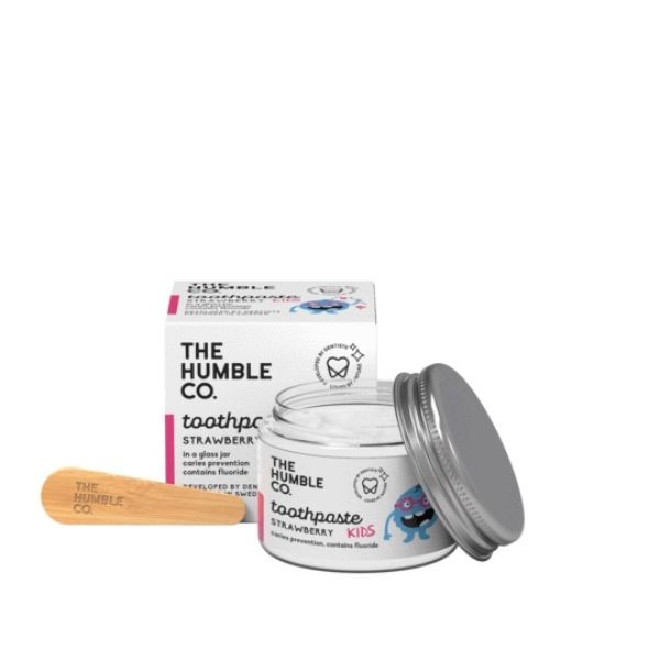 Creme dentífrico infantil morango THE HUMBLE CO. com embalagem e espátula de madeira