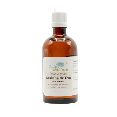 Frasco de óleo vegetal de grainha de uva com etiqueta branca