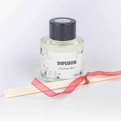 Difusor de fragrância Christmas Spice com frasco de vidro, varetas de madeira e laço vermelho