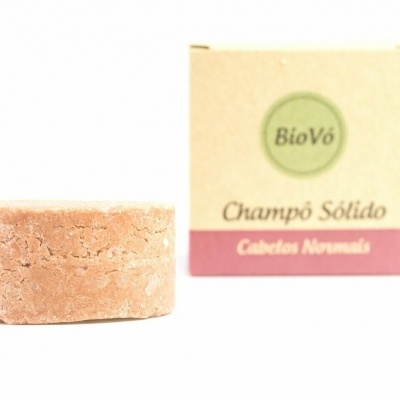 Champô sólido cor de rosa e caixa de champô BioVó para cabelos normais