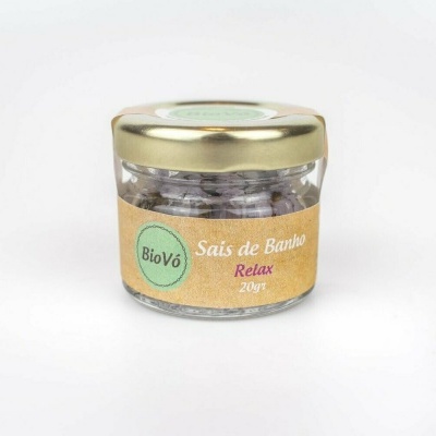 Frasco de sais de banho com tampa dourada e rótulo bege com texto