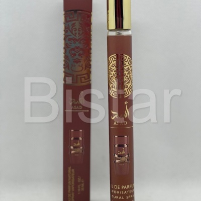 Frasco e caixa de perfume castanho com detalhes dourados e texto