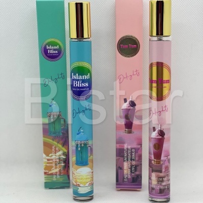 Dois perfumes eau de parfum com tampas douradas e embalagens coloridas Island Bliss e Yum Yum