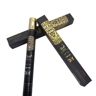 Perfume ASAD em frasco cilíndrico preto com tampa dourada e caixa preta com design dourado