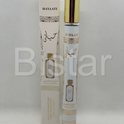 Perfume HAYAATI GOLD ELIXIR frasco vidro com tampa dourada e caixa branca com detalhes dourados