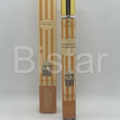 Perfume Whipped Pleasure com embalagem riscada bege e amarelo com imagem de cupcake