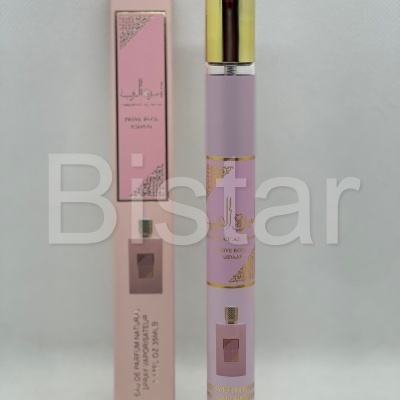 Frasco e caixa de perfume lilás com tampa dourada