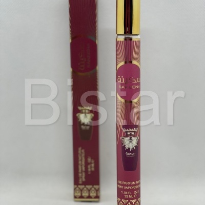 Frasco e caixa de perfume spray vinho e dourado com texto Sakeena.