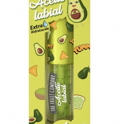 Embalagem amarela com ilustrações de abacates e texto em espanhol de aceite labial com frasco transparente contendo líquido verde