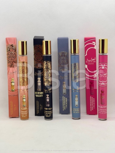Conjunto de frascos de perfume Gissah em embalagens coloridas com detalhes dourados e tampas douradas