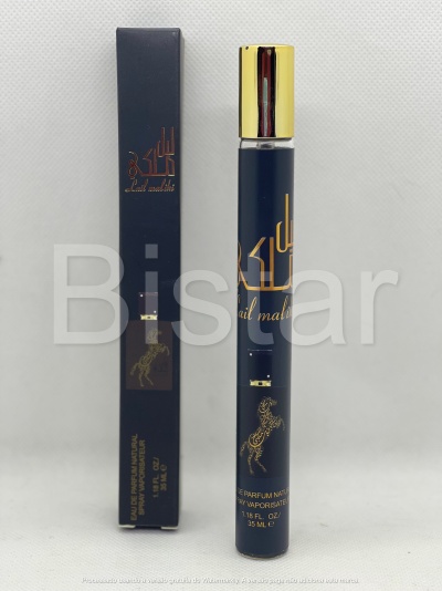 frasco de perfume preto com tampa dourada e caixa preta