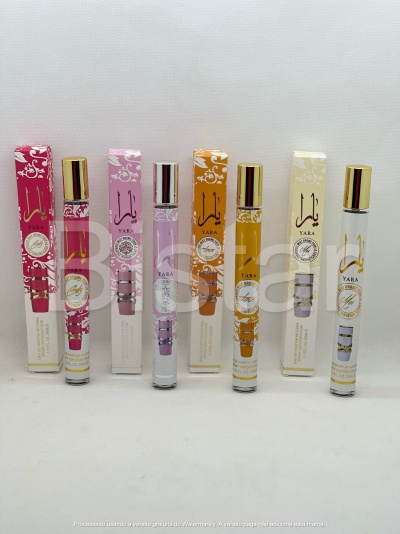 Frascos de perfume YARA em cores rosa, lilás, laranja e creme com caixas