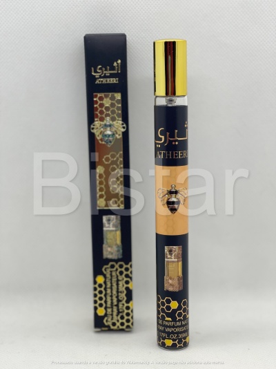 Frasco de perfume e embalagem preta com detalhes em dourado e imagem de abelha.