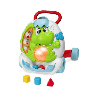 Brinquedo educativo de plástico em forma de crocodilo verde com luz laranja e rodas azuis