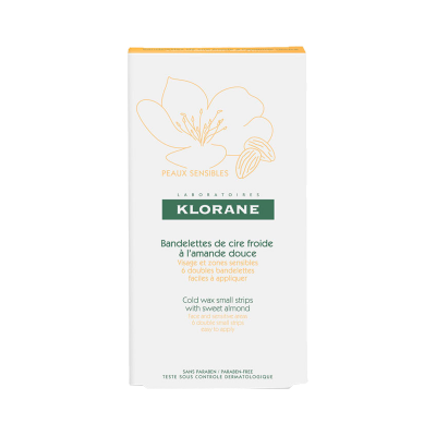 Embalagem branca com texto e ilustração de flor do produto Klorane de tiras de cera fria com amêndoa doce