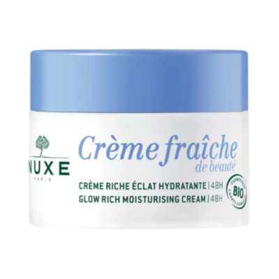 Frasco de creme hidratante Nuxe com tampa azul