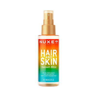Frasco de spray NUXE Hair and Skin Sunset Bliss com tampa dourada e rótulo colorido
