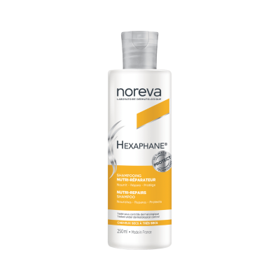 Frasco de shampoo Noreva Hexaphane 250 ml com rótulo amarelo e branco