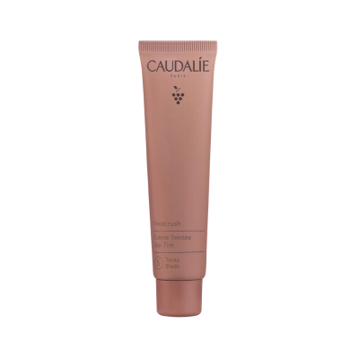 Tubo bronze de creme facial Caudalie Vinocrush com texto