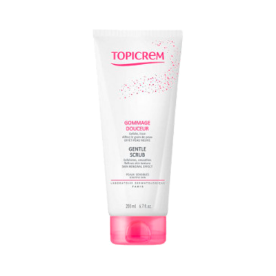 Tubo branco com tampa rosa do esfoliante Topicrem Gommage Douceur Gentle Scrub