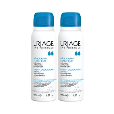 Duas embalagens brancas de desodorizante spray Uriage com tampa azul