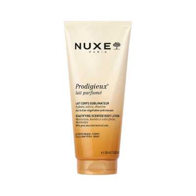 Tubo de loção corporal perfumada NUXE Prodigieux com embalagem creme e laranja