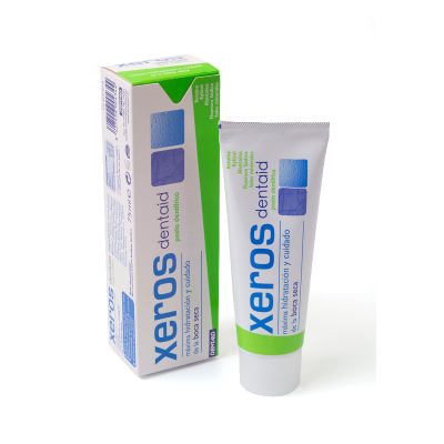 Creme dentífrico Xeroso branco com embalagem azul e verde