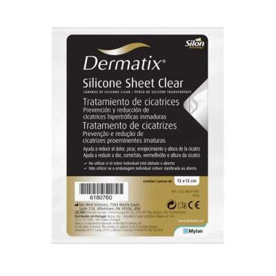 Embalagem preta e dourada do produto Dermatix Silicone Sheet Clear com texto informativo sobre tratamento de cicatrizes