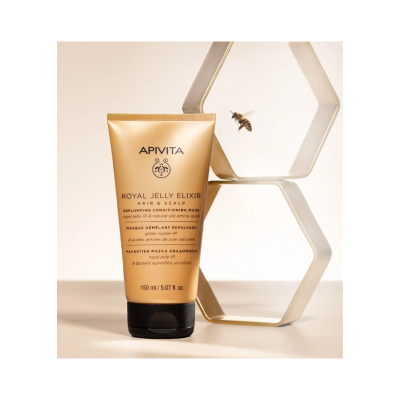 Tubo dourado APIVITA Royal Jelly Elixir com abelha e estrutura hexagonal