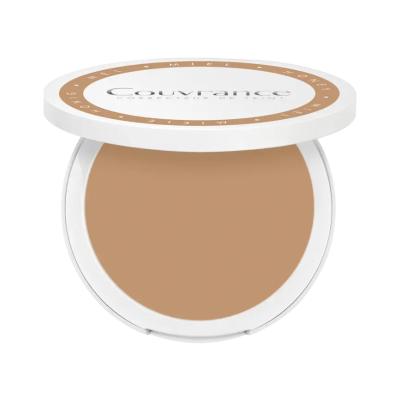 Compacto de maquilhagem Couvrance cor mel com embalagem branca.