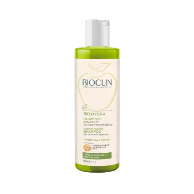 Frasco de shampoo BIO-HYDRA BIOCLIN com rótulo de maçã verde e tampa branca