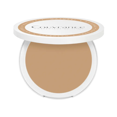 Pó compacto corrector Couvrance em embalagem branca com tampa e texto