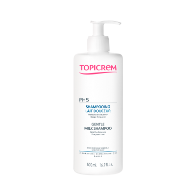 Frasco branco de champô Topicrem Gentle Milk Shampoo 500 ml com doseador